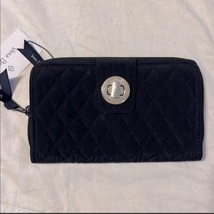 NWT Vera Bradley Navy blue quilted, cross stitch pattern, turn lock wallet.